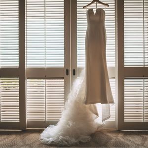 Vera Wang wedding dress. Color: White Size: 0 (sewn in bra cups)